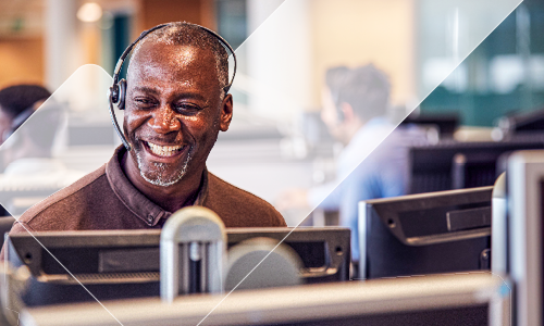 Man smiling in dealership call centre